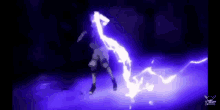 a person is standing in a dark room with a purple lightning bolt coming out of their hand .