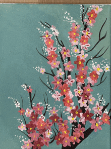 a painting of a cherry blossom tree with pink flowers on a blue background