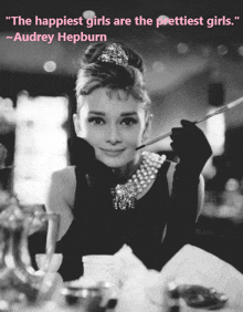 a black and white photo of audrey hepburn with a quote by her