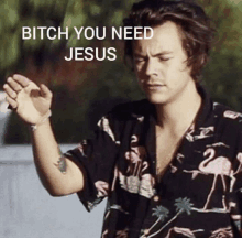 harry styles is wearing a flamingo shirt and says bitch you need jesus