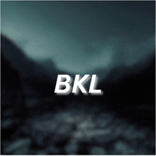 a blurry picture of a river with the word bkl on it