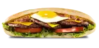 a sandwich with eggs cheese lettuce and tomatoes on a bun