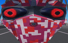 a close up of a face with red eyes and a geometric pattern