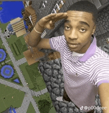 a young man in a purple and white striped shirt salutes in front of a minecraft world