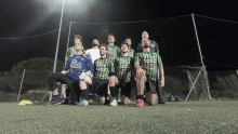 a group of soccer players are posing for a picture with one wearing a jersey that says ' tex '