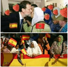 a man kissing a woman with strawberries on their faces