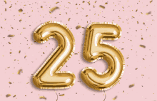 the number 25 is made out of gold balloons on a pink background