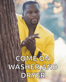 a man in a yellow suit is peeking out from behind a tree with the words come on washer and dryer below him