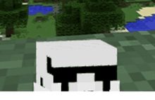 a white block with a black t on it in a minecraft game