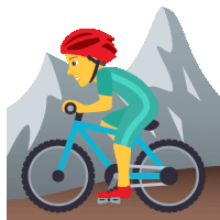 a man wearing a red helmet is riding a bicycle