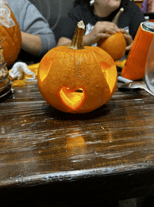 a pumpkin with a heart cut out of it