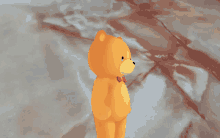 an orange teddy bear with a red bow tie stands on a marble surface