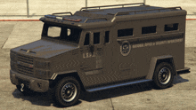 a l.s.p.d. armored truck is parked on the side of the road