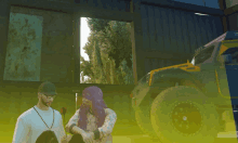 a man and a woman are standing in front of a vehicle that says ' jeep ' on it