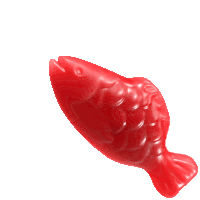 a red gummy fish with its mouth open