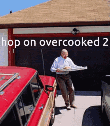 a man is carrying a tray of food in front of a garage door that says hop on over cooked 2