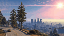 a car is driving down a road with the city in the background