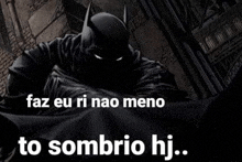 a picture of a batman in the dark with the words `` faz eu ri nao meno to sombrio hj '' .