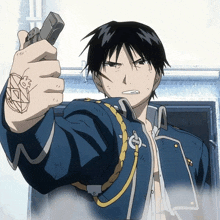 a man in a blue uniform is pointing a gun