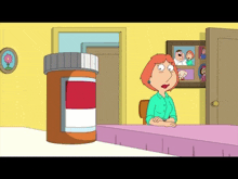 lois griffin from family guy is sitting at a table with a large bottle of pills behind her