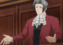 a man in a red suit and white tie stands in a courtroom