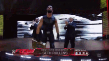 a wrestler named seth rollins is on the stage