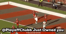 a group of football players running on a field with the words " @playoffchubb just owned you " written above them