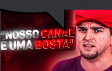 a man wearing a red hat with the words " nosso canal e uma bosta "