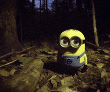 a yellow minion with big eyes and overalls is standing in the woods