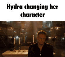 a man standing in front of a table with candles and the words hydra changing her character above him