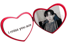 a heart shaped mirror with the words i miss you ace