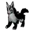 a black and white dog is standing on a white surface .