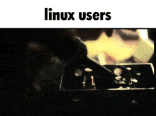 a picture of a person working on a machine with the words linux users on the bottom