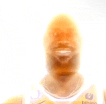 a blurred image of a man with a beard wearing a nike jersey .