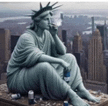 a statue of liberty is sitting on a ledge drinking a beer