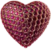 a heart shaped brooch with a lot of pink stones on it