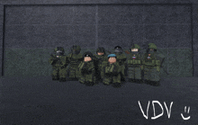 a group of soldiers are standing in front of a wall with the word vdv written on the bottom