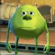 mike wazowski from monsters inc is standing in a bedroom with a sad face .