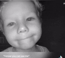 a black and white photo of a child with the words " i know you can see me " below it