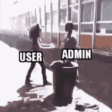 a woman is standing next to a trash can with the words `` user '' and `` admin '' on it .