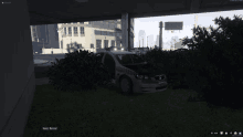 a screenshot of a video game shows a police car in a grassy area