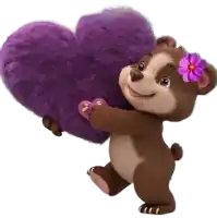 a teddy bear holding a purple heart with a flower in its hair