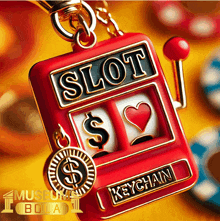 a red slot machine keychain with a heart and dollar sign