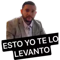 a man in a suit has a sign that says esto yo te lo levanto