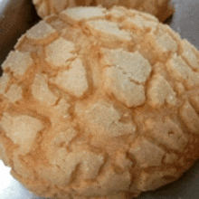 a close up of a bread that looks like a melon