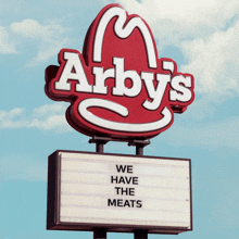 a sign for arby 's says we have the meats on it