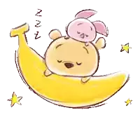 winnie the pooh and piglet are sleeping on a yellow banana