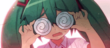 a girl with green hair is wearing a pair of glasses with spirals on them