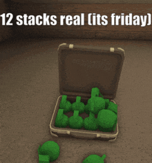 a briefcase filled with green objects and the words 12 stacks real its friday