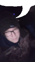 a blurry picture of a person wearing glasses and a beanie